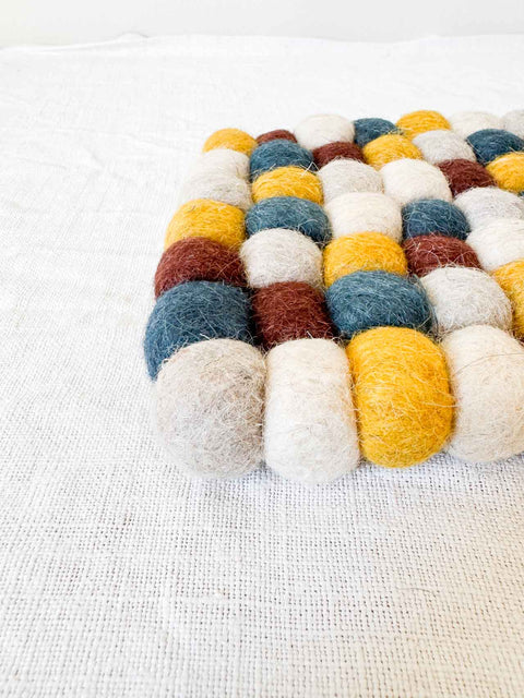 Dessous de plat en feutrine Ochre