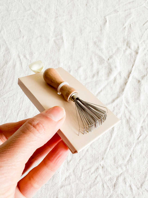 Peigne nettoyant pour brosse