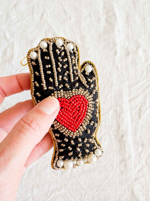 Suspension Ex voto Main